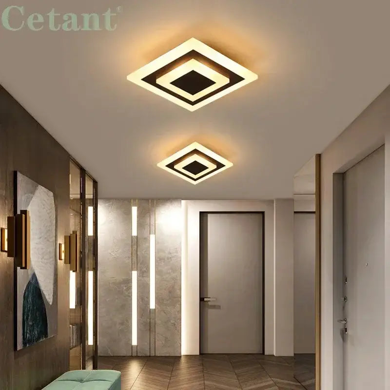 Modern white and gold led ceiling light with layered geometric design featuring illuminated white frames and black accents