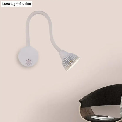 Modern white flexible gooseneck wall sconce light with circular base and ribbed head for direct wired electric reading