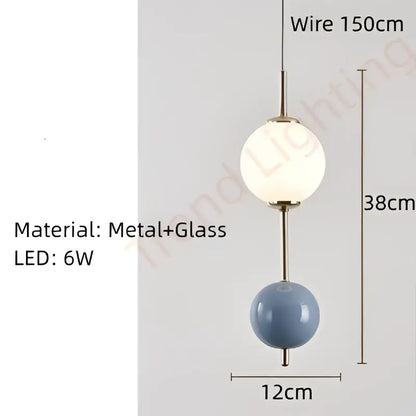 Modern pendant light with frosted white glass globe and matte blue ceramic sphere for dining room decorbites colorful ball led