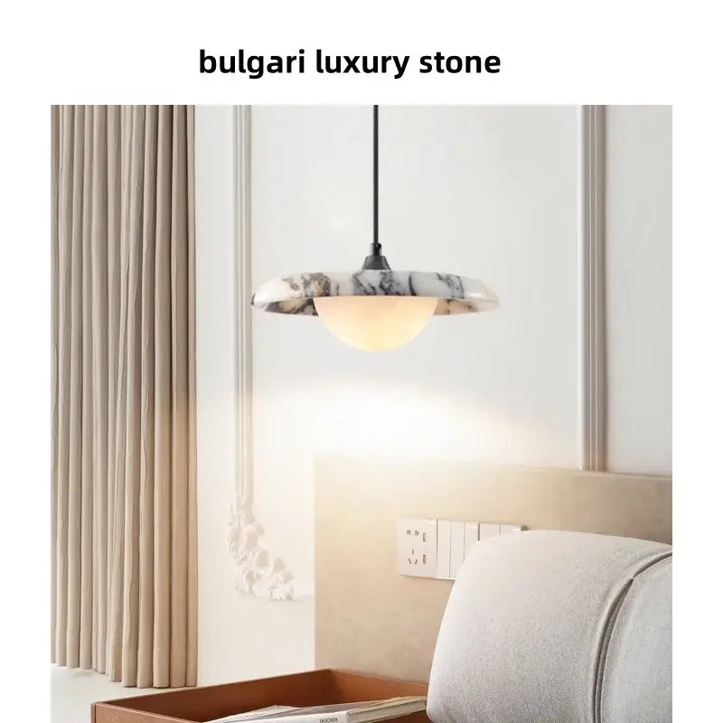 A modern white and gray marble pendant light with a warm glass shade and printed ball led by decorbites 3d printed