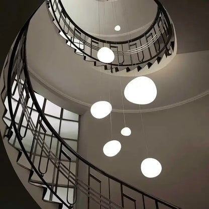 Modern white gregg glass suspension pendant light with spherical design hanging in villa staircase decorbites pendant light