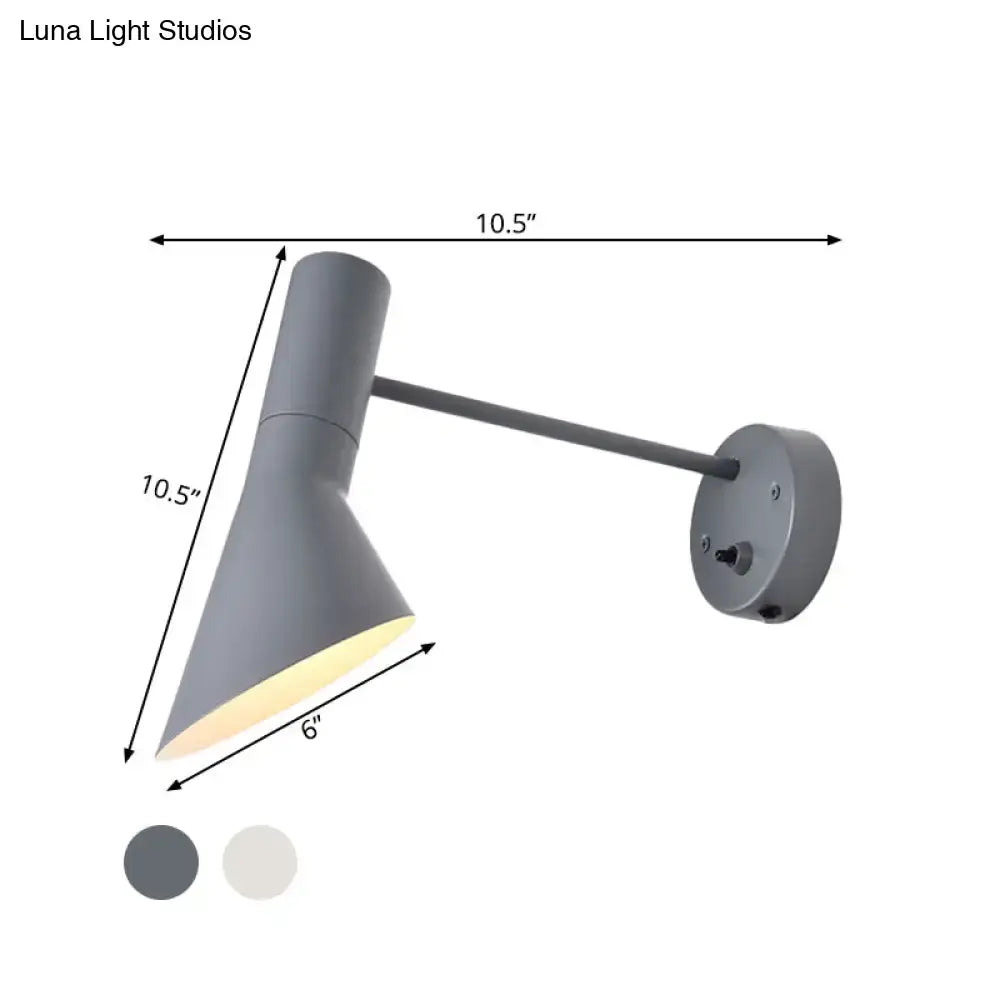 Gray matte-finished wall-mounted reading lamp with sleek adjustable arm and conical shade in white grey rotating node design