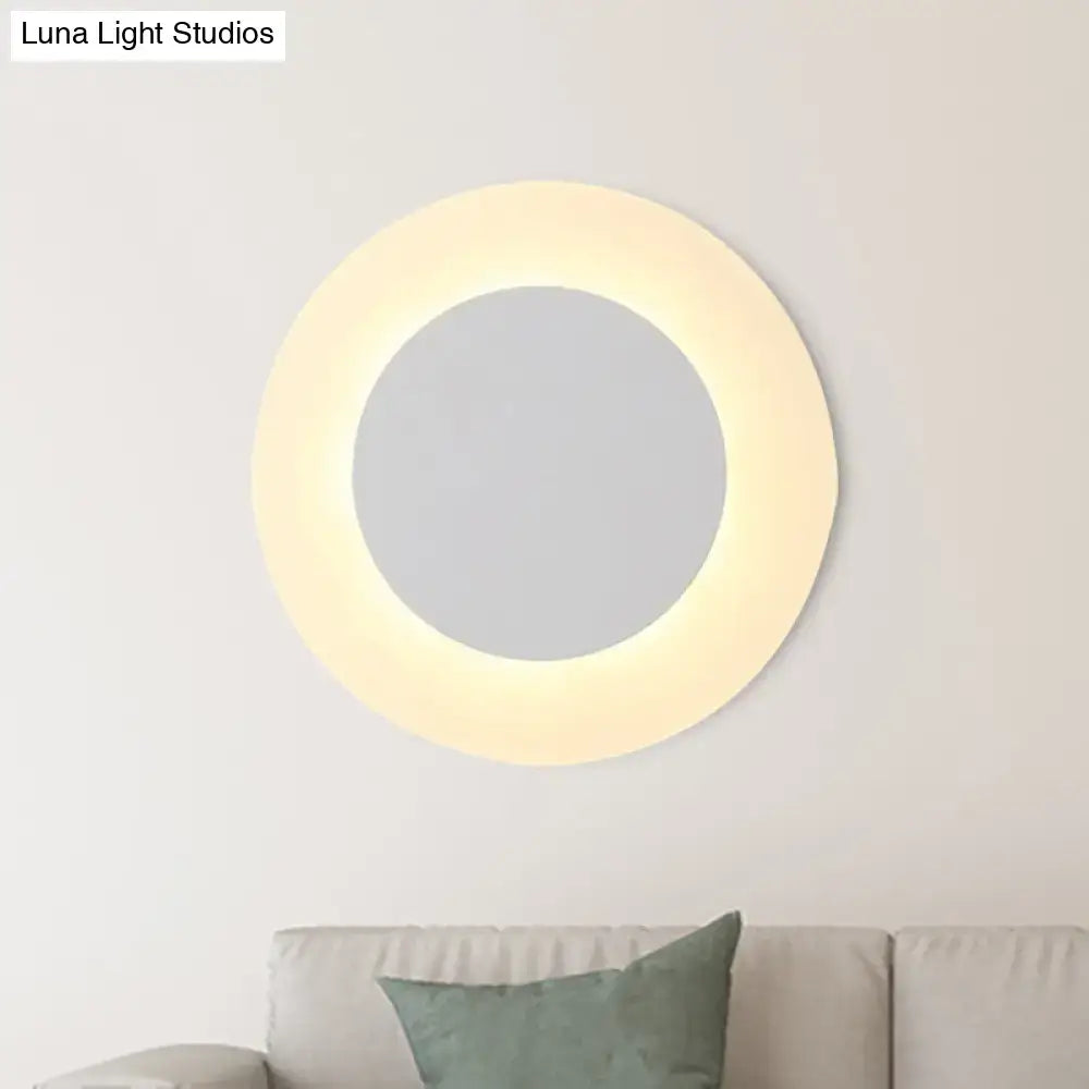 Modern white halo ring wall lighting fixture with circular mirror and warm-toned led ring for bedroom lighting fixture