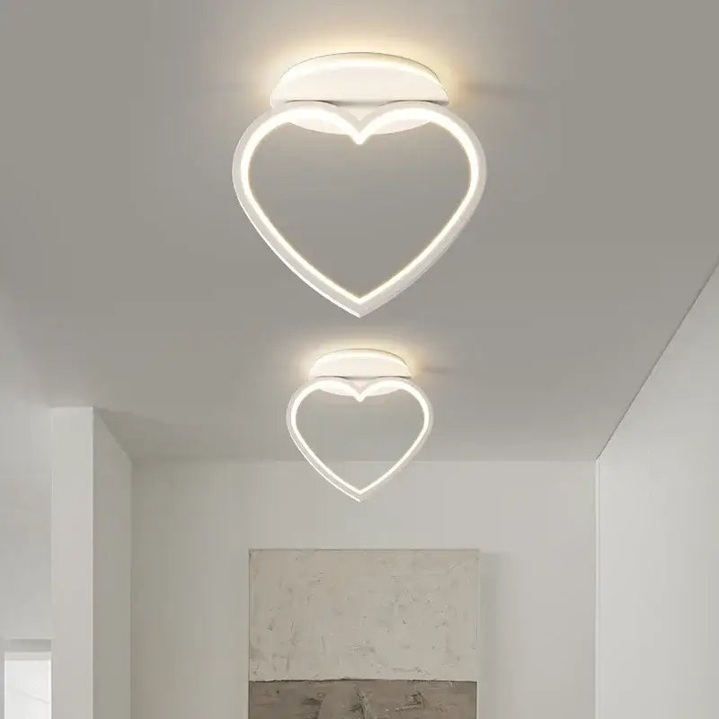 Modern white heart ceiling light with two led fixtures emitting a soft glow ideal for bedroom decorbites ceiling light