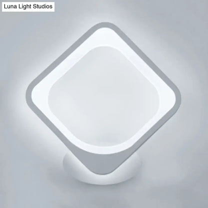 Modern white diamond-shaped led wall sconce with sleek minimalist design for bedroom lighting