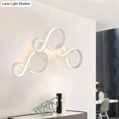 Modern white infinity-shaped wall sconce led light with bulb included featuring a sleek, spiral design for living rooms