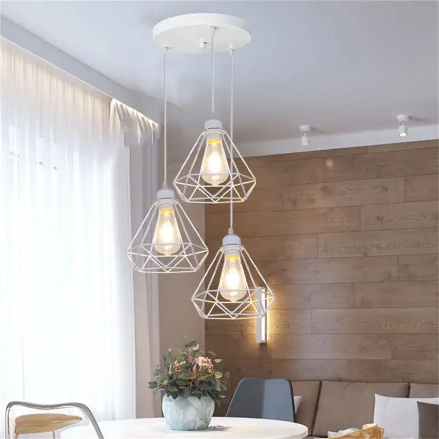 Modern white iron cage pendant lights with exposed bulb filaments for kitchen and living room decorbites iron cage