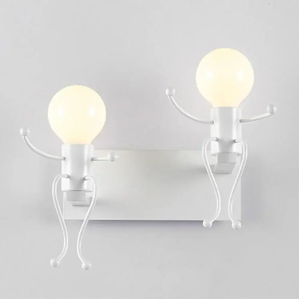Modern white iron man cartoon wall sconce made of metal with two whimsical lightbulb figures and articulated limbs