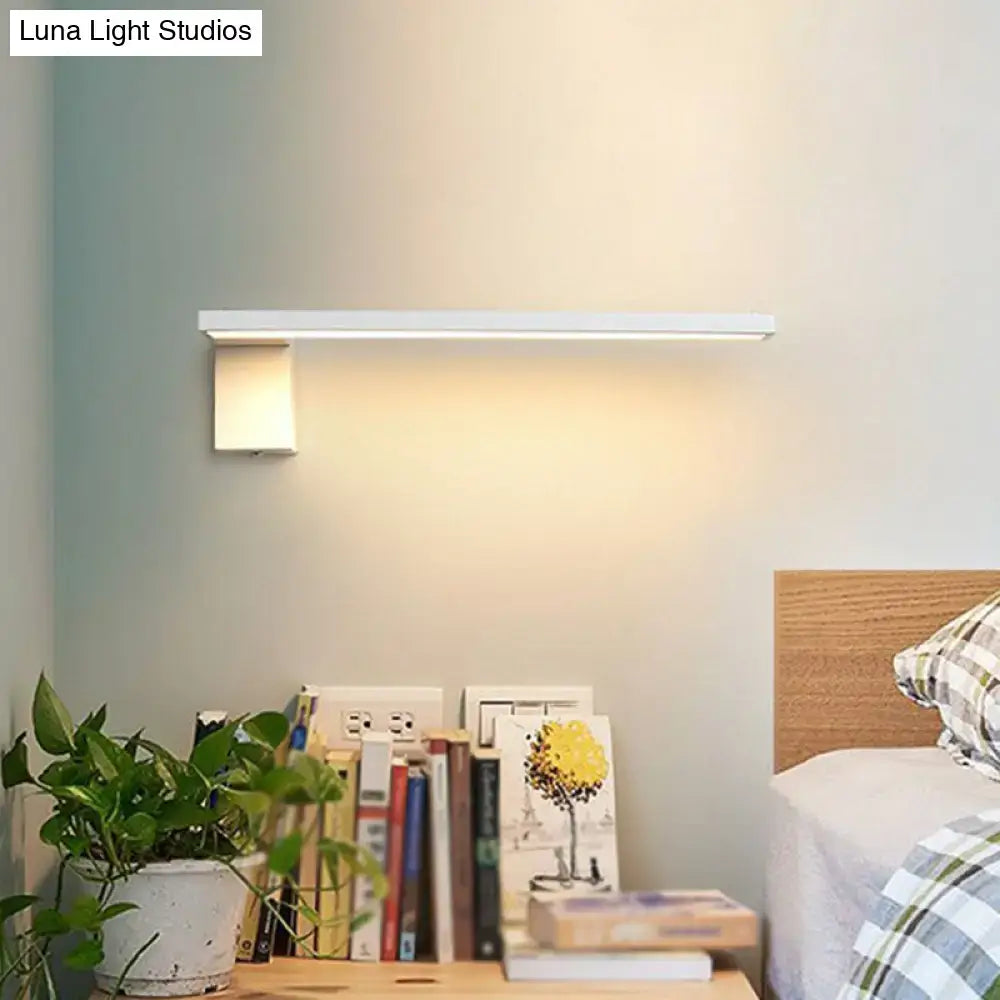 Modern white l-shaped led wall sconce with sleek rectangular design and soft warm light for living room lighting