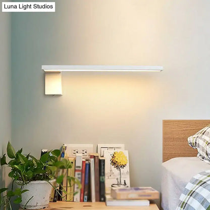 Modern white l-shaped led wall sconce with sleek rectangular design and soft warm light for living room lighting