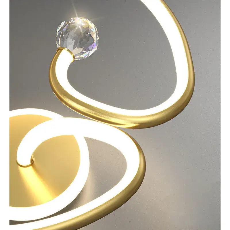 Modern white led ceiling light chandelier with gold-toned curved rings and faceted crystal accent for living room decorbites led ceiling
