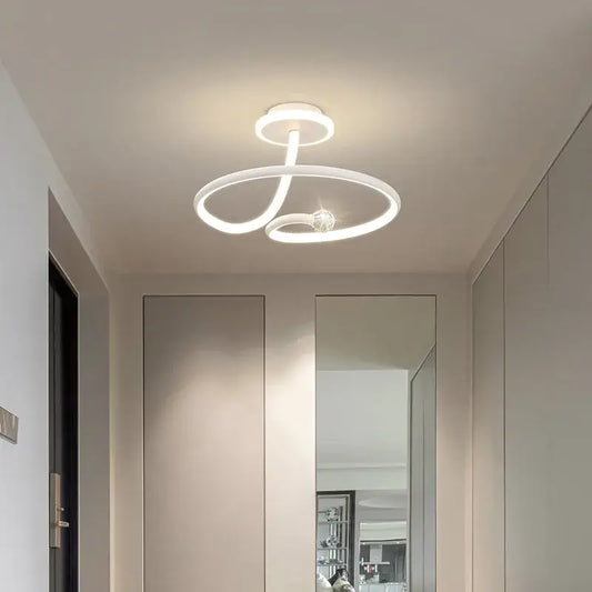 Modern white led ceiling light chandelier with sleek intertwined circular design and central crystal for living room decorbites led ceiling