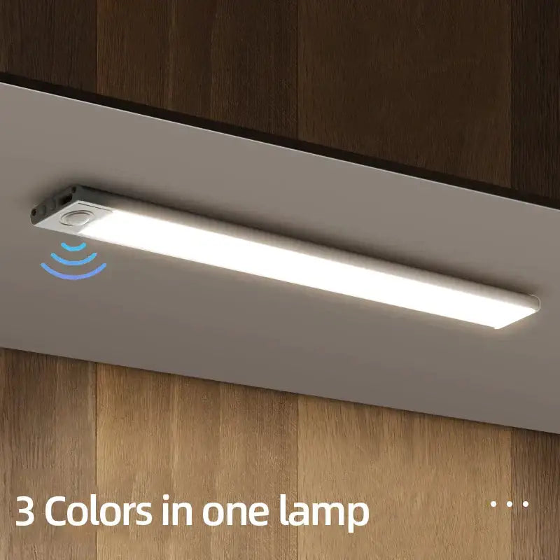 Modern white led motion sensor cabinet light with sleek design and integrated sensor for smart illumination