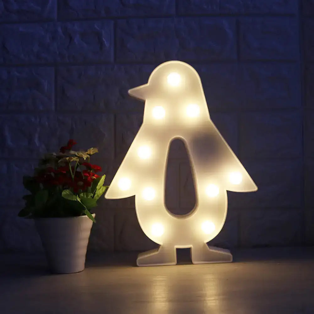 Modern white penguin-shaped led nightstand light with warm bulbs as a christmas element with remote control