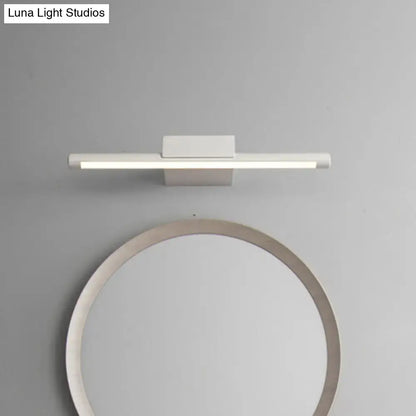 Modern white led vanity lamp with acrylic shade and sleek rectangular design emitting warm white light for bathroom wall use