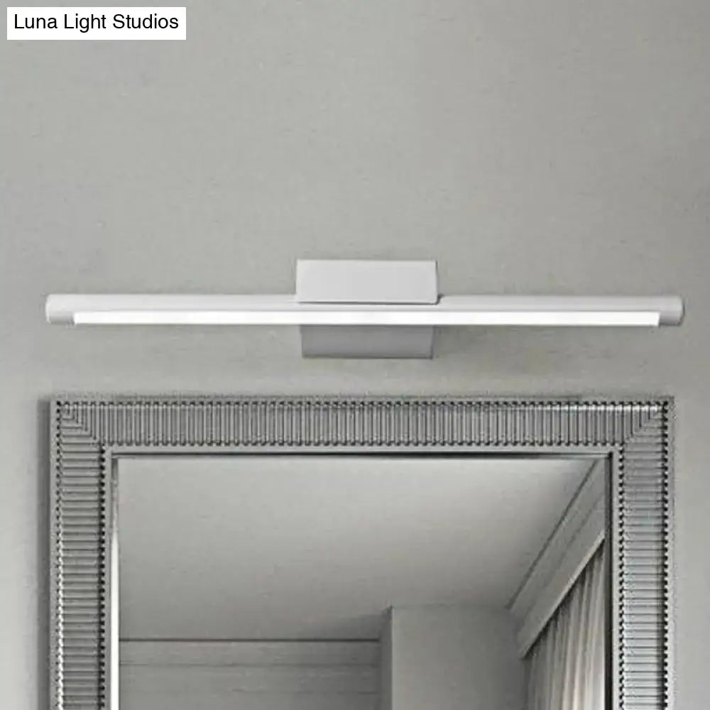 Modern white led vanity lamp with acrylic shade emits warm white light for bathroom wall lighting with a minimalist design