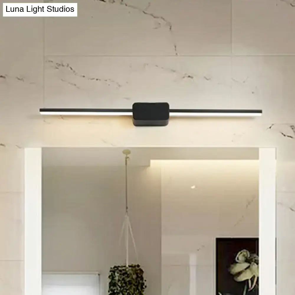 Modern black rectangular led wall mounted bathroom vanity light with sleek minimalist design above mirror