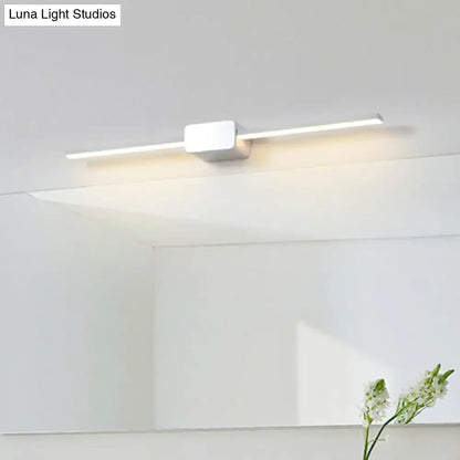 Modern white led wall mounted bathroom vanity lamp with sleek rectangular design and minimalist led wall fixture