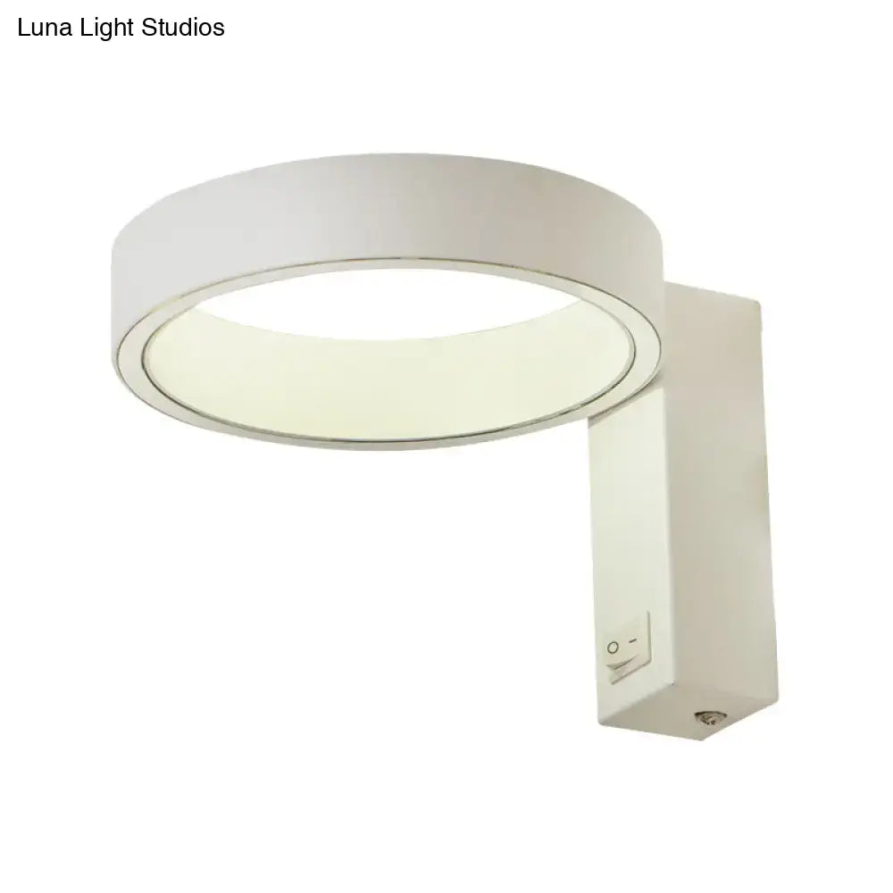 Modern white led wall sconce with sleek minimalist design and integrated on off switch for direct wired power source