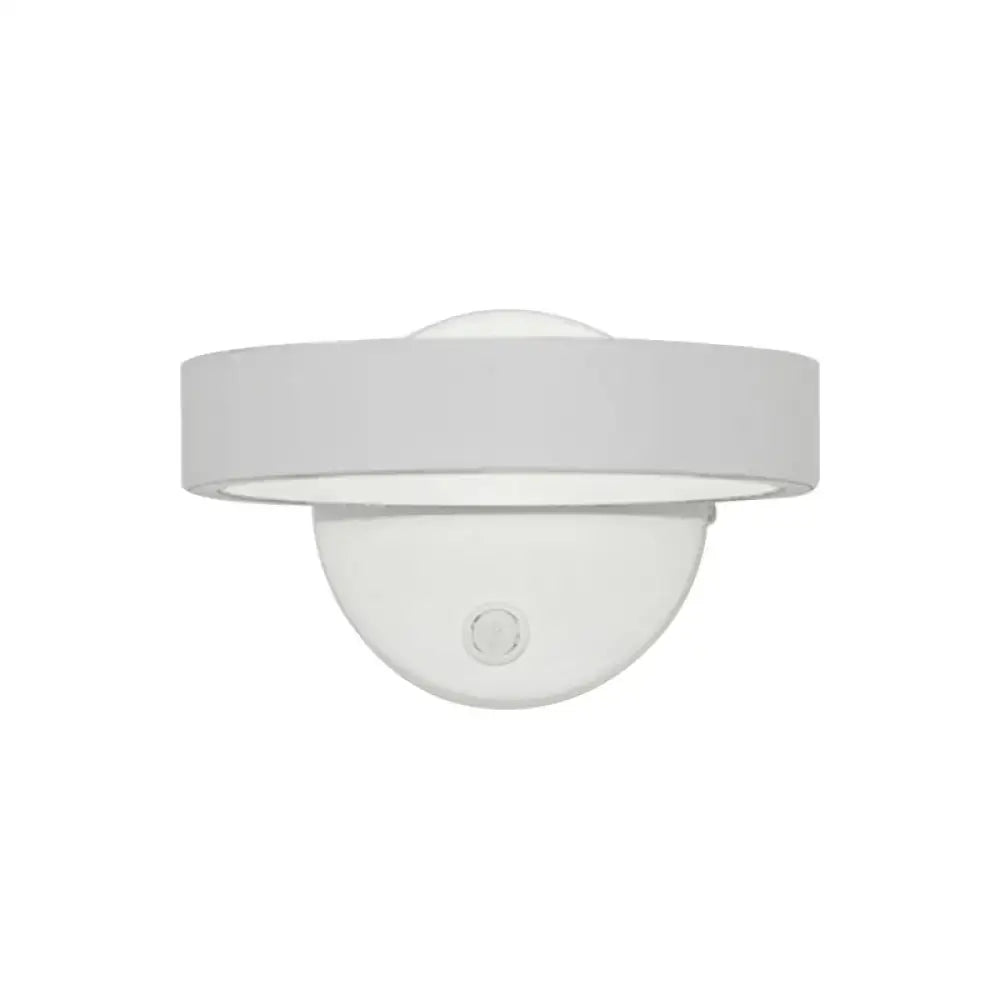 Modern white led wall sconce with sleek circular shade and dome base direct wired for living room power source