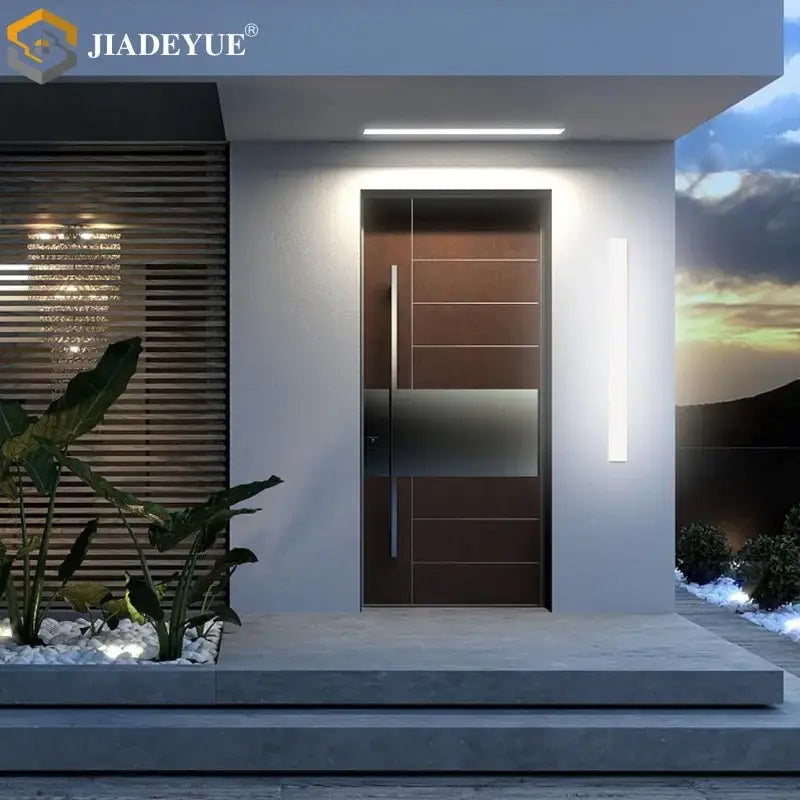 Modern white led waterproof garden wall lamp sconce installed beside a brown brushed metal horizontal panel front door