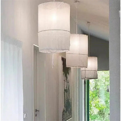 Modern white linen cotton pendant lamp with sheer fabric and subtle bands for kitchen island lighting decorbites linen cotton pendant