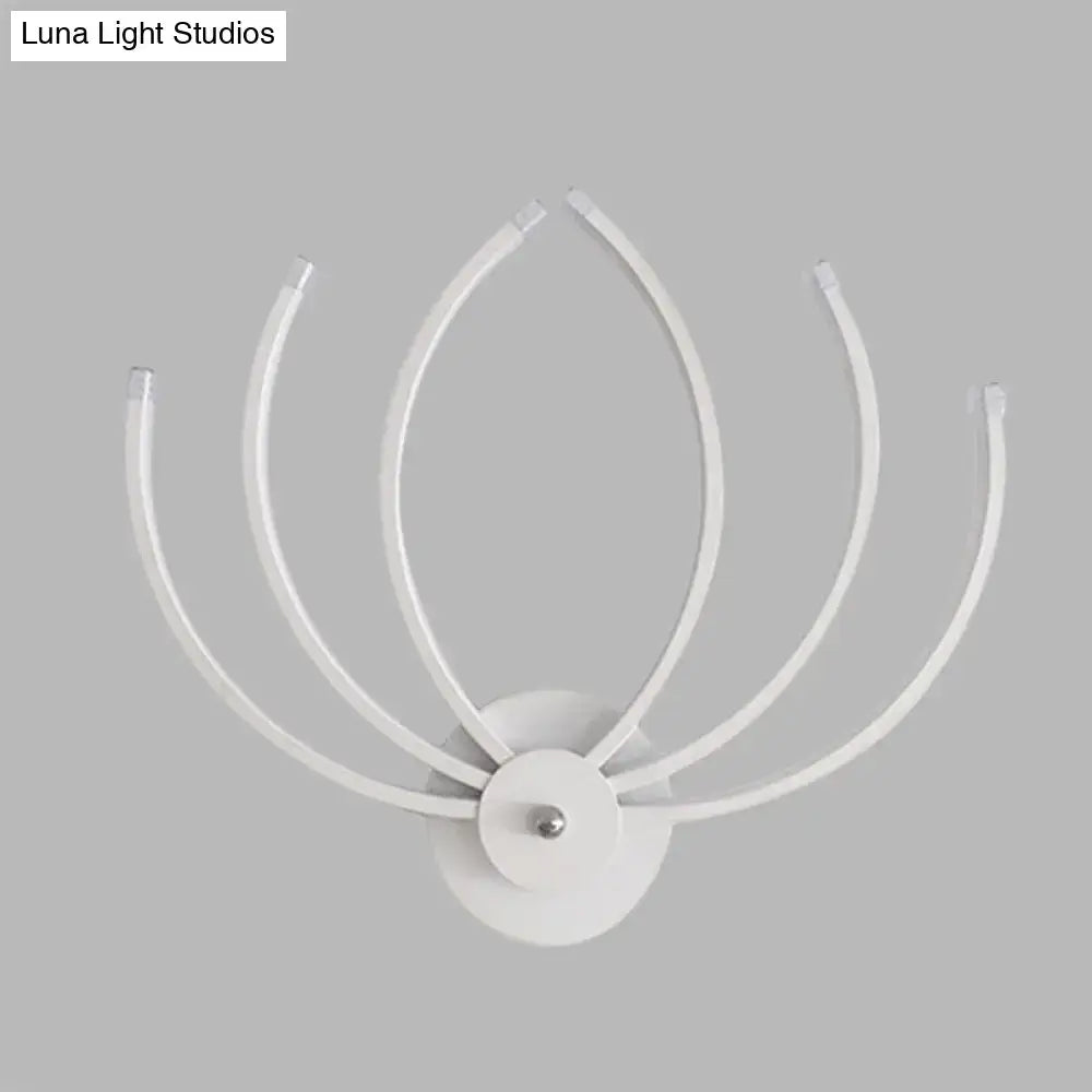 Modern white lotus wall sconce with five curved slender arms radiating from a circular base for bedroom lighting