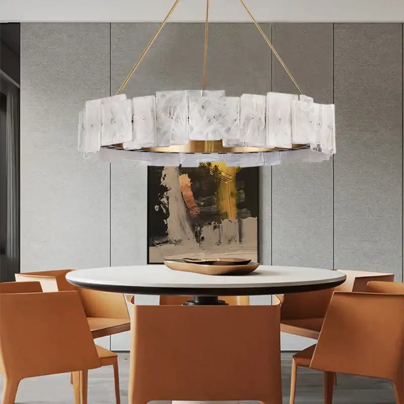 Modern circular pendant lights with cloud mist glass panels and gold-toned frame for dining room decorbites cloud mist