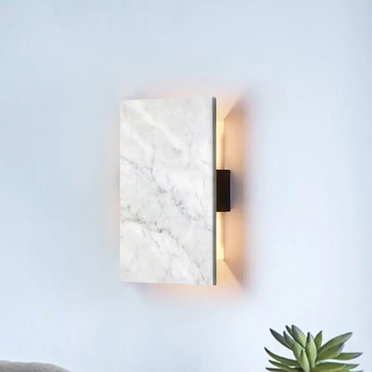 Modern white marble rectangular bedside wall sconce with sleek black bracket featuring a stylish design wall light