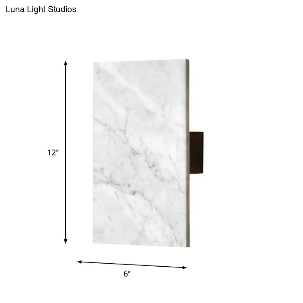 Modern white marble rectangular bedside wall sconce with dark bronze bracket for stylish wall light design
