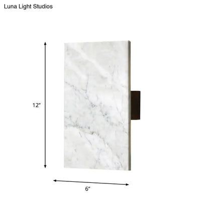 Modern white marble rectangular bedside wall sconce with dark bronze bracket for stylish wall light design