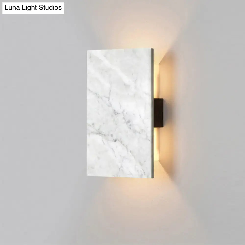 Modern white marble textured rectangular bedside wall light with black metal bracket for stylish bedroom lighting