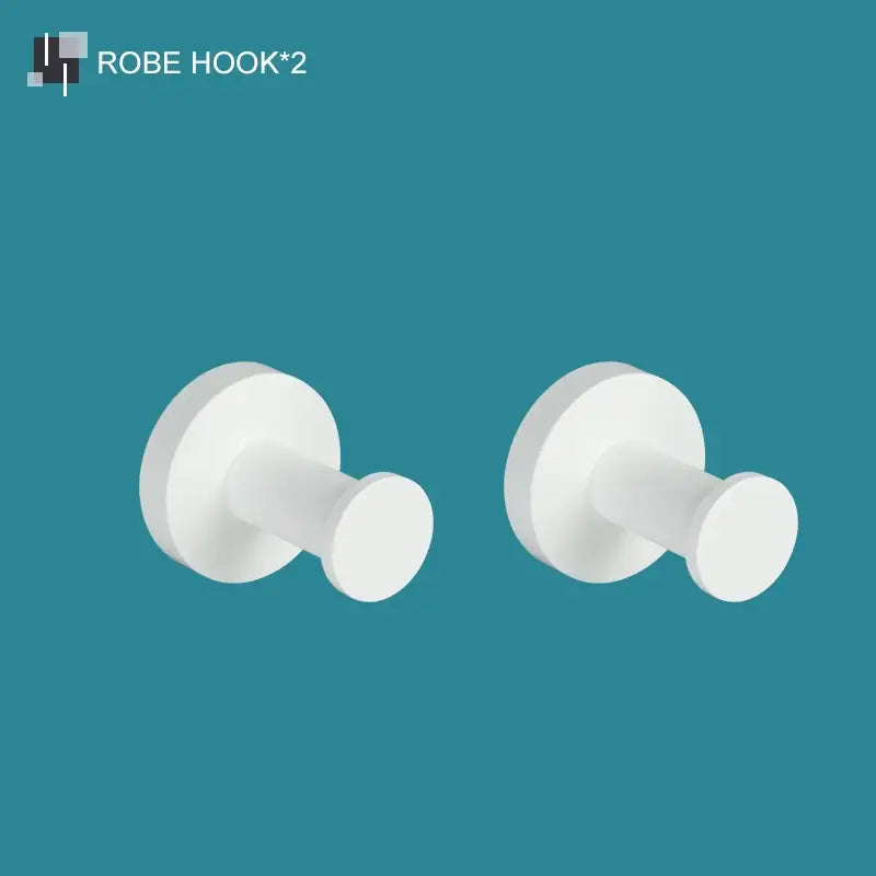 White matte metal robe hooks with smooth rounded design in a decorbites bathroom accessory set for modern decorbites bathroom