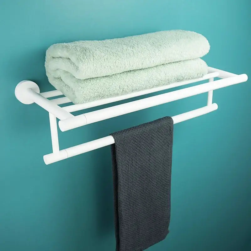Modern white matte metal wall-mounted towel rack holding mint green and dark gray towels from decorbites bathroom accessory set