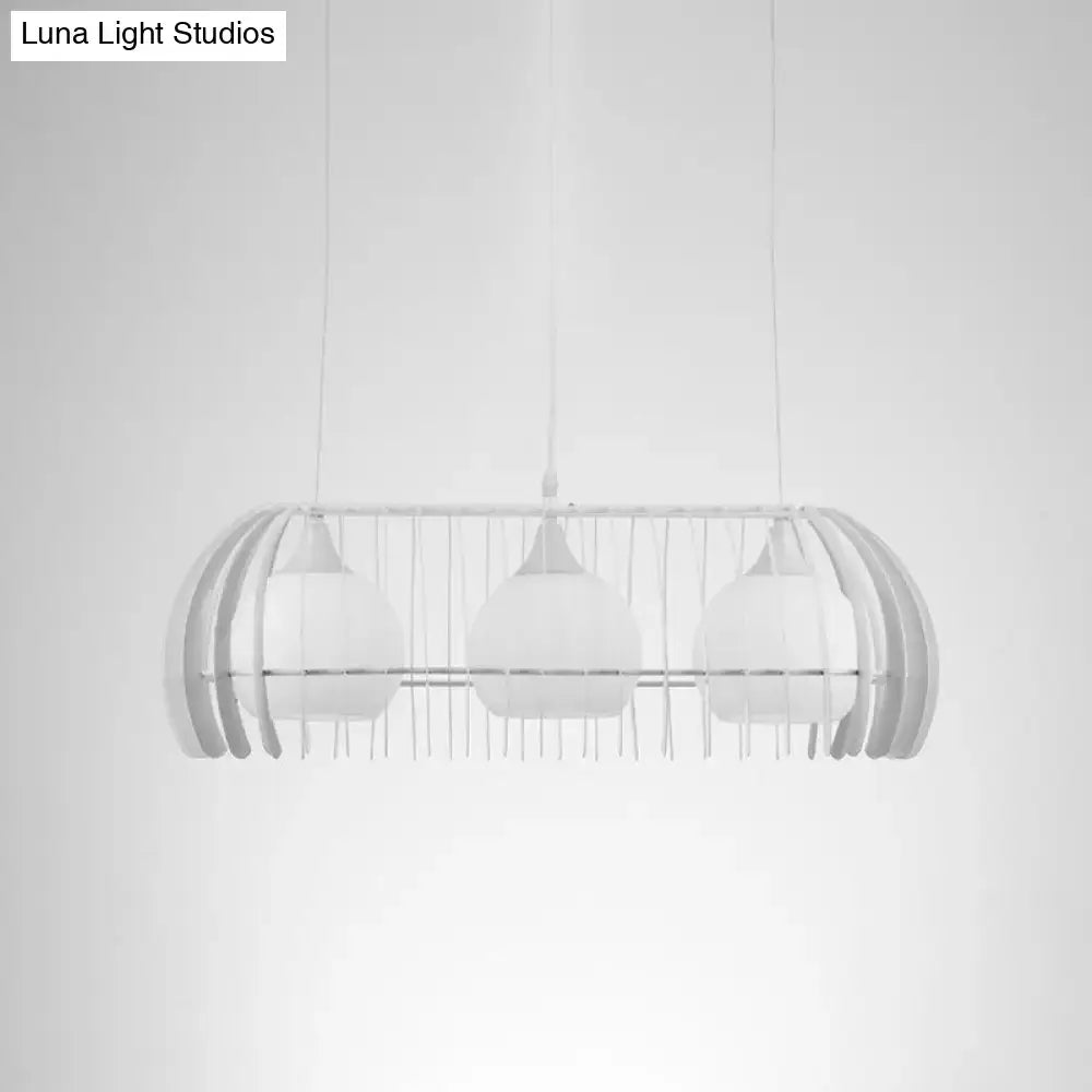 Decorbites™ modernist pendant lamp with three white frosted glass globes in a metal cage frame for dining room island light fixture