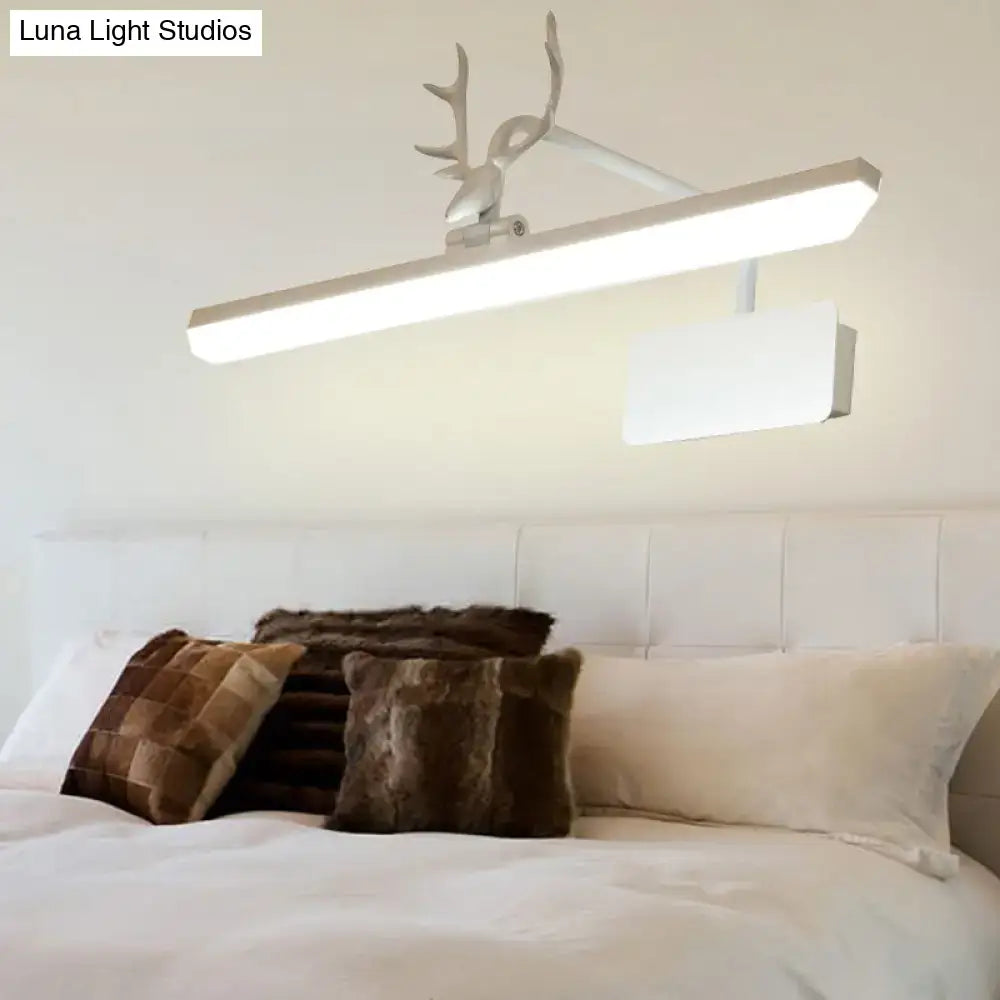 Silver deer-head mounted led vanity wall lamp in white metal with sleek modern design for bathroom use