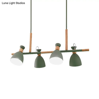 Modern olive green metal dome shade island chandelier with wooden accents and four adjustable lamp heads by DecorBites