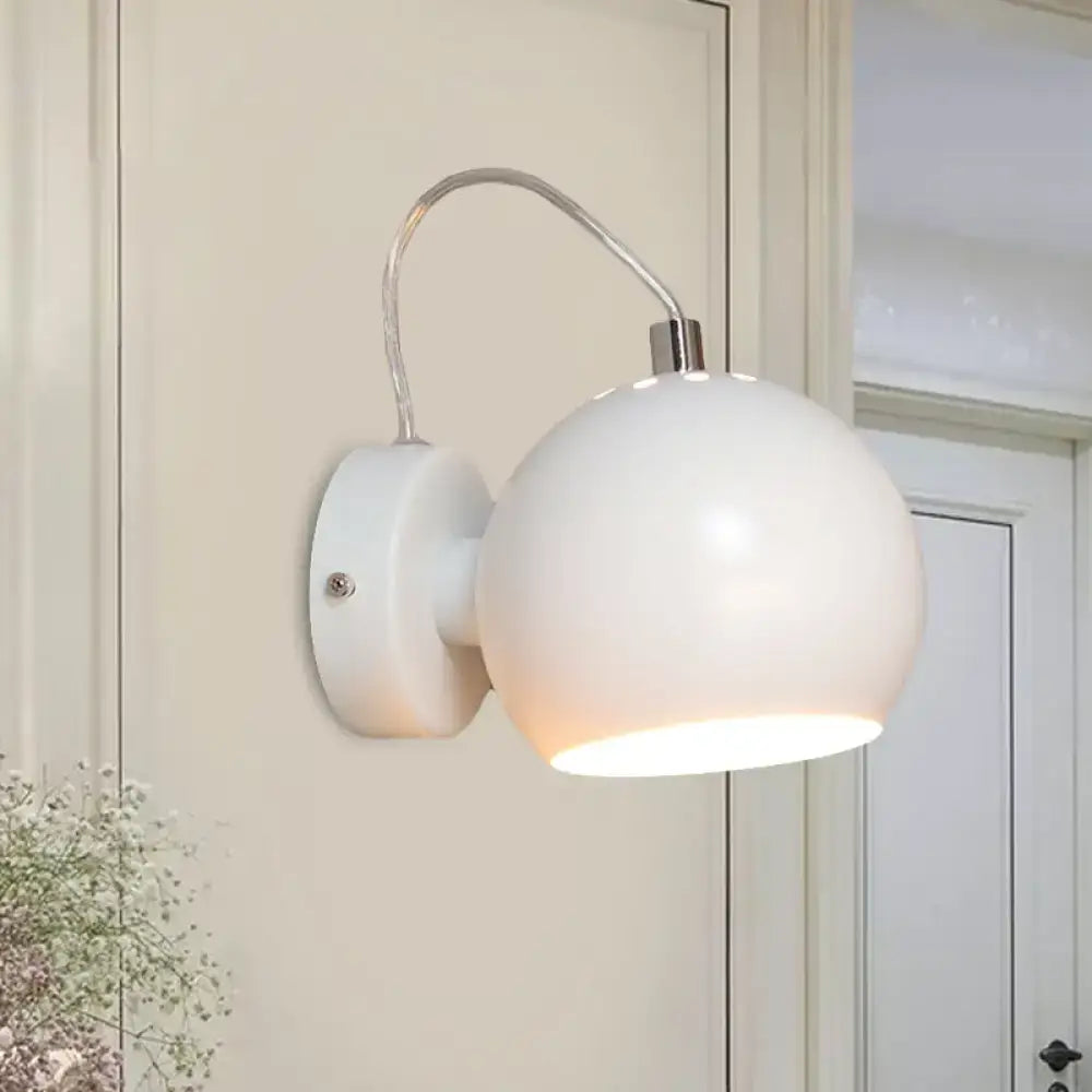 Modern white metal shade wall light with spherical matte finish and curved arm for bedroom 110v-120v fixture