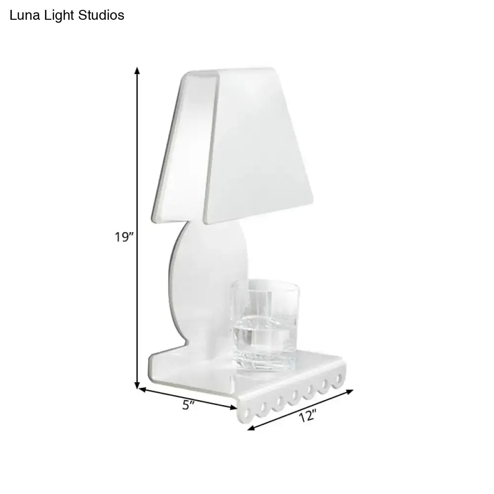 Modern white metal trapezoid wall sconce light with acrylic lamp and integrated glass coaster for bedroom use