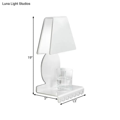 Modern white metal trapezoid wall sconce light with acrylic lamp and integrated glass coaster for bedroom use