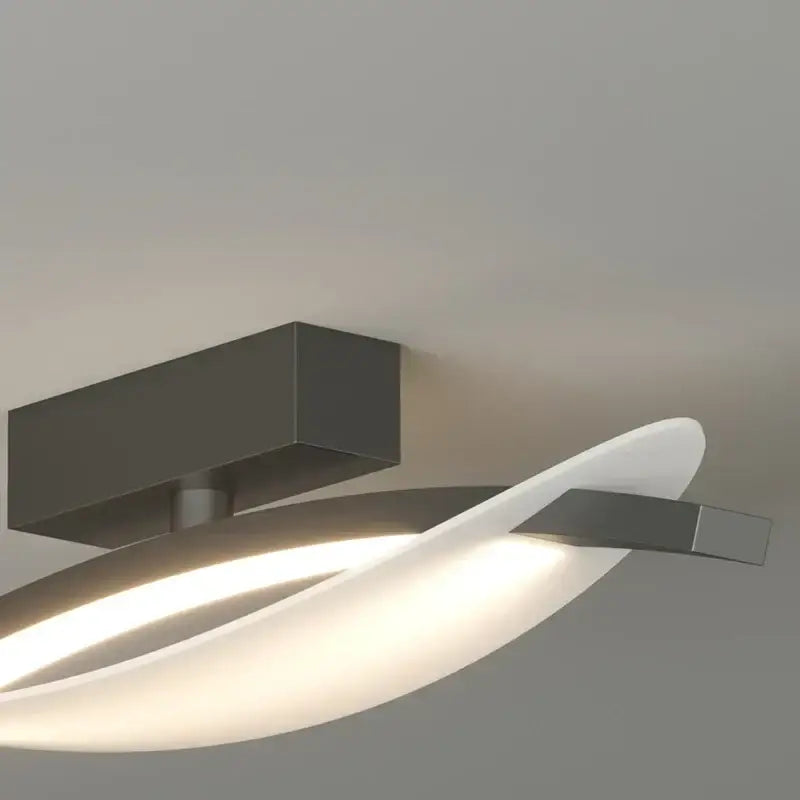Modern white minimalist led ceiling light strip with sleek curved diffuser and dark gray metallic housing for living room