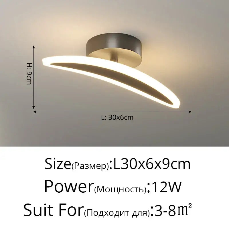 Modern white minimalist ceiling light strip with sleek curved design, illuminated led strip, and brushed metallic base