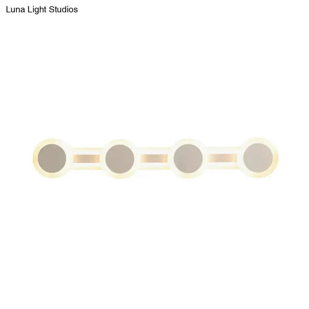 Modern white minimalist led vanity light bathroom wall sconce with four frosted glass panels and warm metallic frame 110v-120v maximum bulb wattage