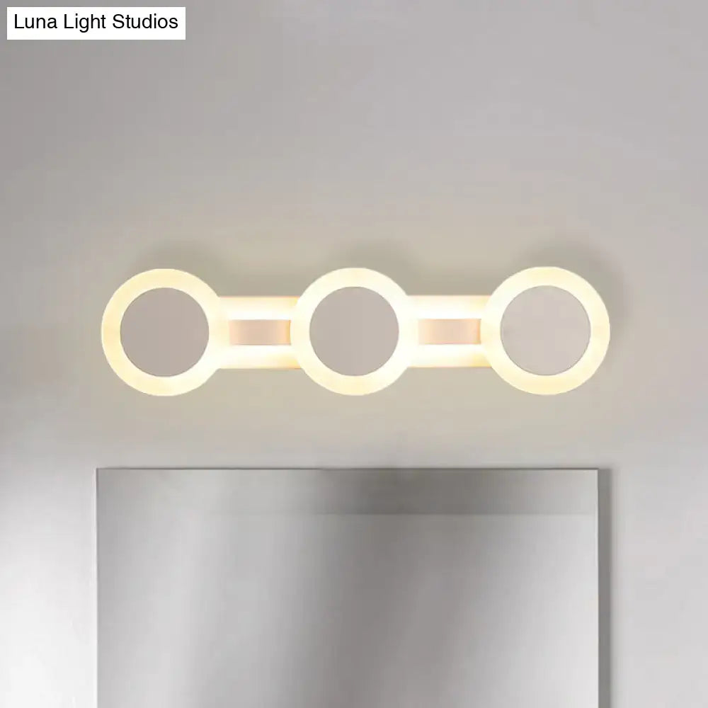 Modern white minimalist led vanity light with three-circle design and warm white illumination for 110v-120v use