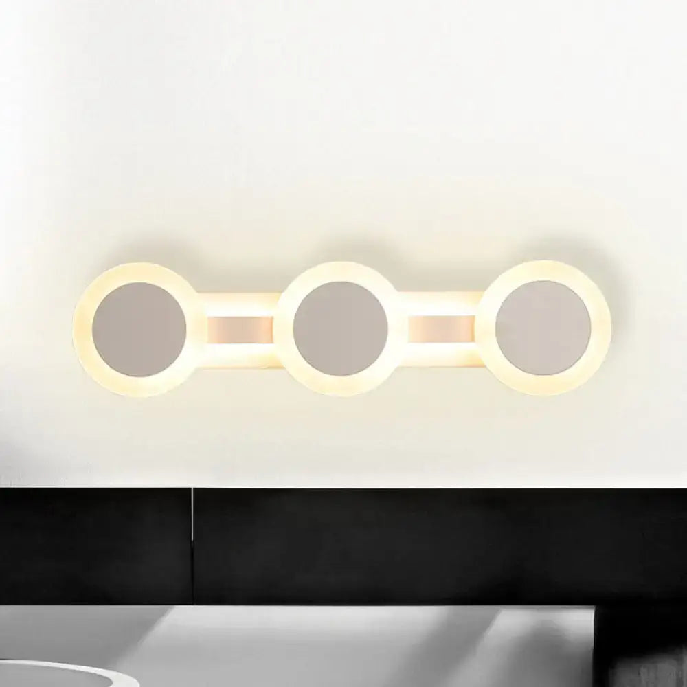 Modern white minimalist three-circle led vanity light with warm white illumination for bathroom wall sconce 110v-120v maximum bulb wattage