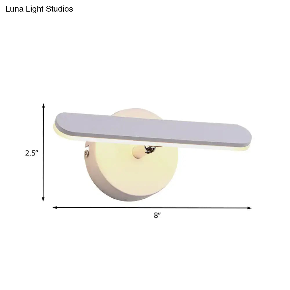 Modern white minimalist wall light with matte gray rectangular bar on cream circular base providing natural warm light and maximum bulb wattage