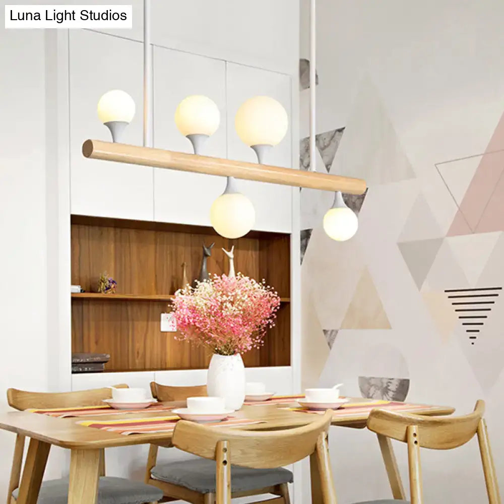 Modern wooden pendant pipe island light with four warm-glowing bulbs for dining room white pipe island lighting
