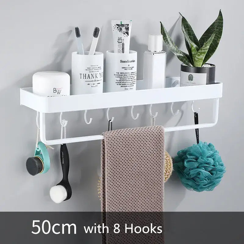 Modern white plastic corner shelf with towel bar holding toiletries and plant for kitchen storage and decorbites black corner use