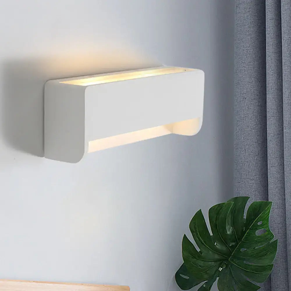 Modern white rectangle gypsum shade wall sconce with sleek minimalist design and warm ambient bedroom led lighting