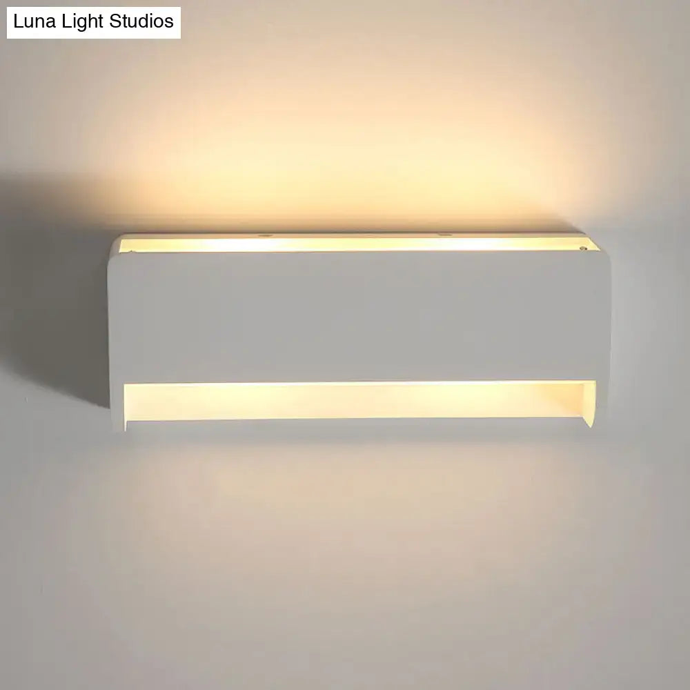 Modern white rectangle gypsum shade wall sconce with warm ambient lighting for bedroom led light use